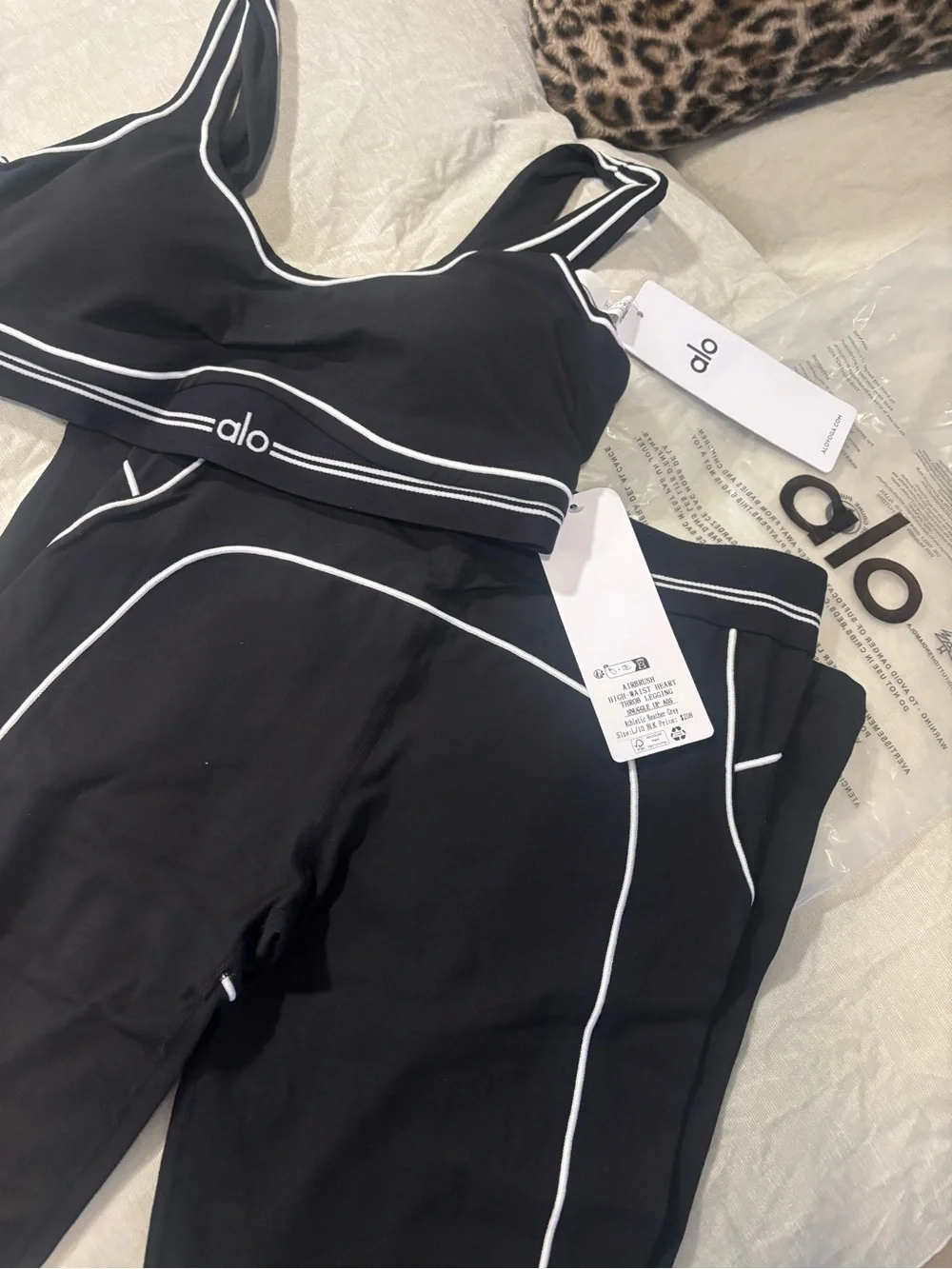 ALO Yoga Black Airbrush Heart Throb bra and matching leggings